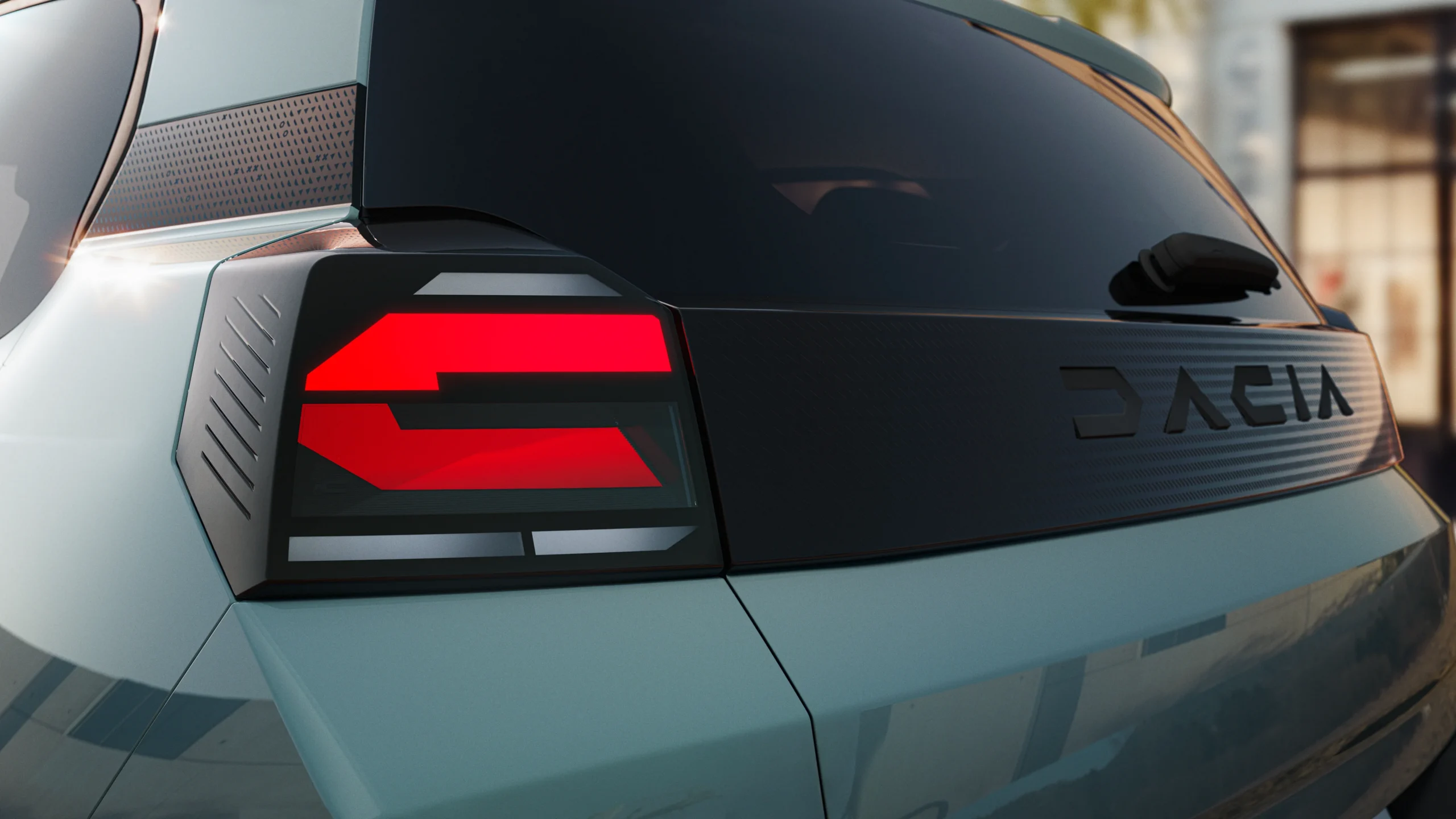Dacia Spring estrena su segunda generación, más robusta y tecnológica 8 Detalle trasero del Dacia Spring con luces LED.