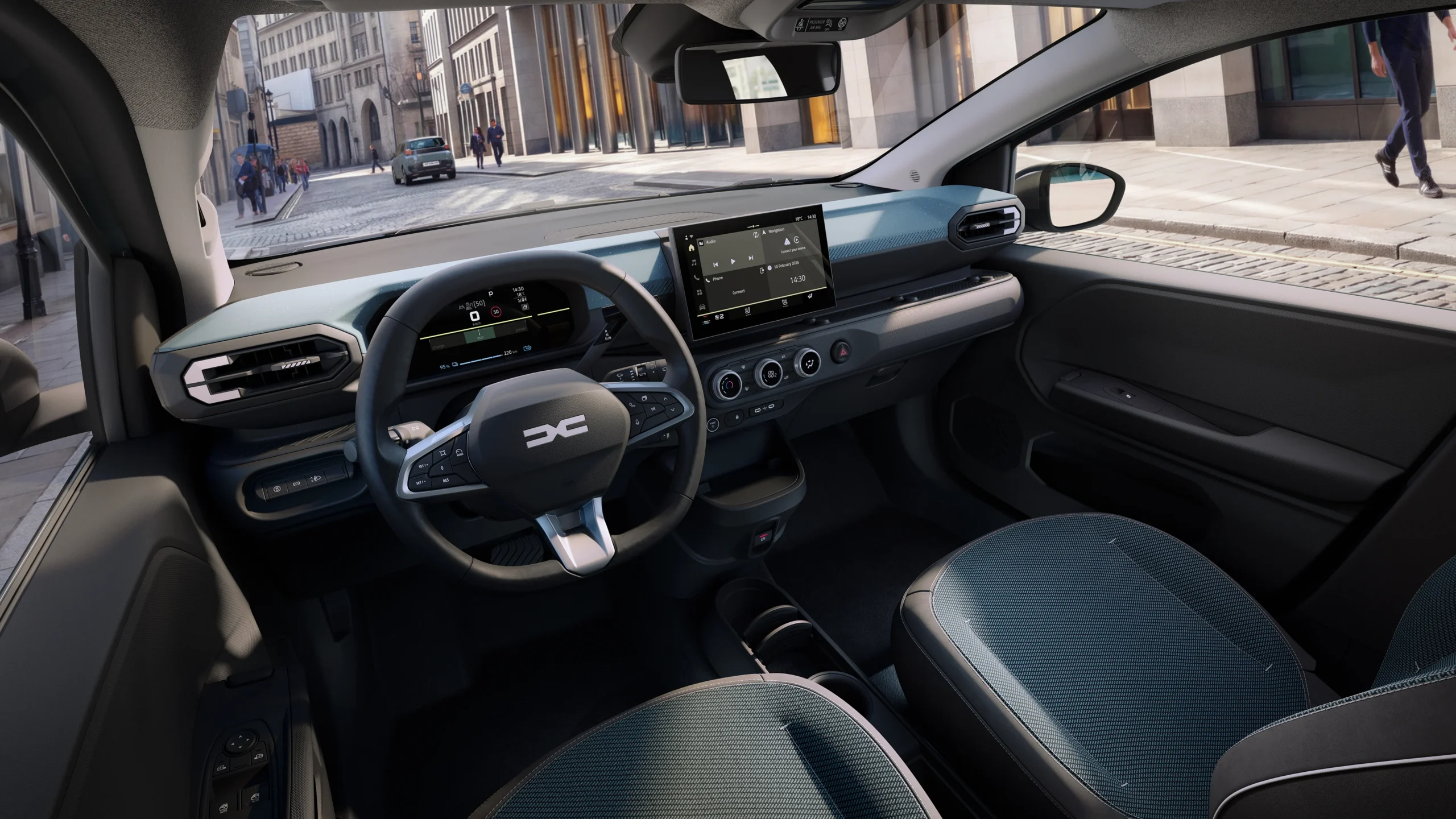 Dacia Spring estrena su segunda generación, más robusta y tecnológica 5 Interior Dacia Spring con pantalla táctil y volante.