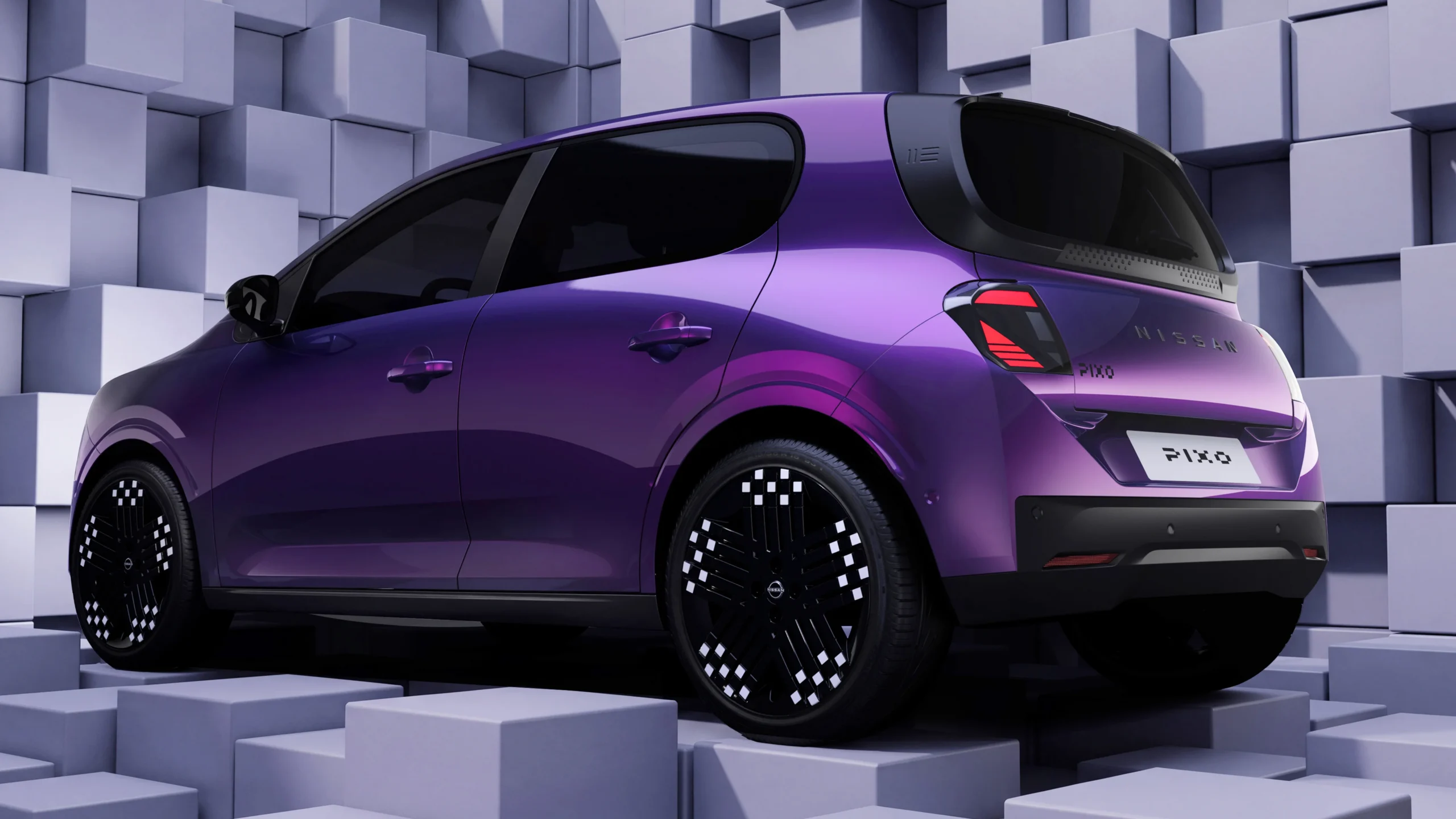 Nissan PIXO: el nuevo carro eléctrico urbano que llega a Europa 2 Nissan Pixo eléctrico en color púrpura, vista trasera lateral.