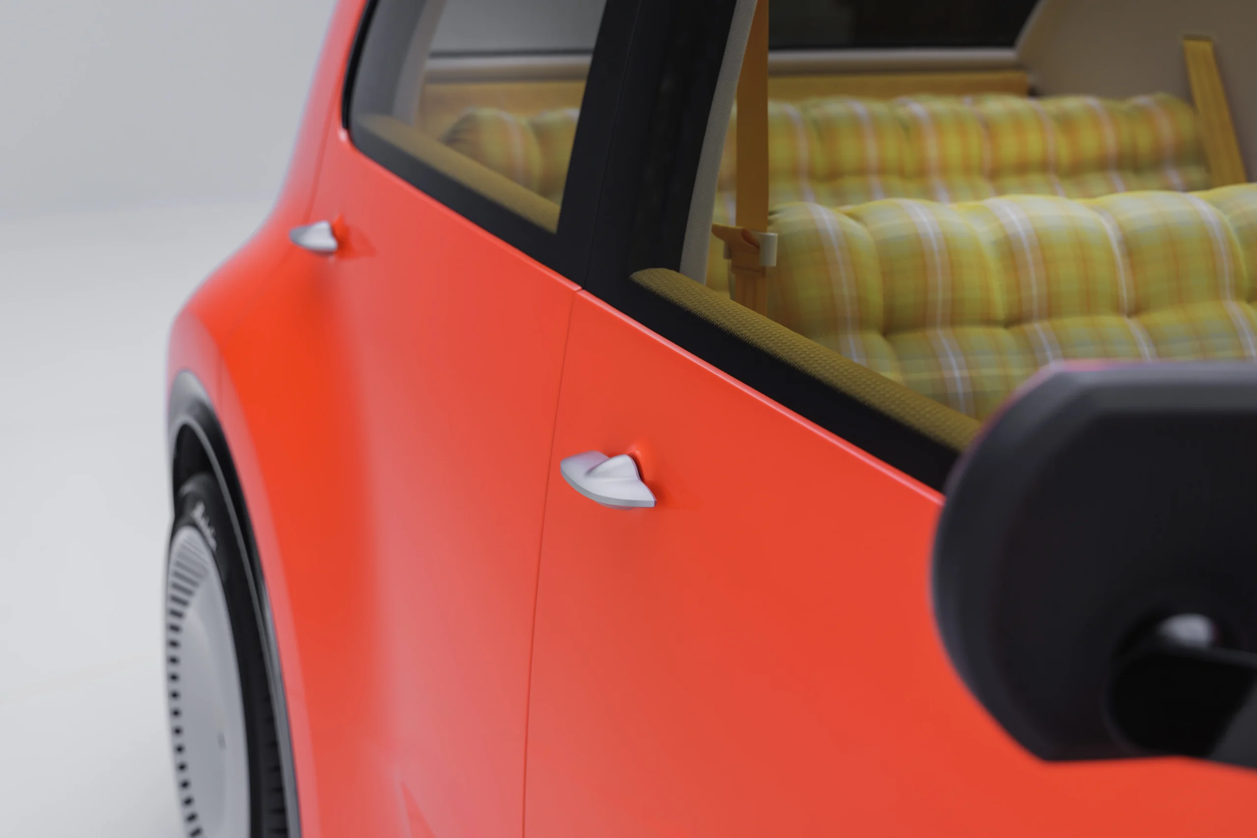 Citroën 2 CV Concept: el renacer eléctrico de un ícono para la movilidad futura 3 Citroën 2 CV Concept: Interior del Citroën 2CV Concept con asientos a cuadros.