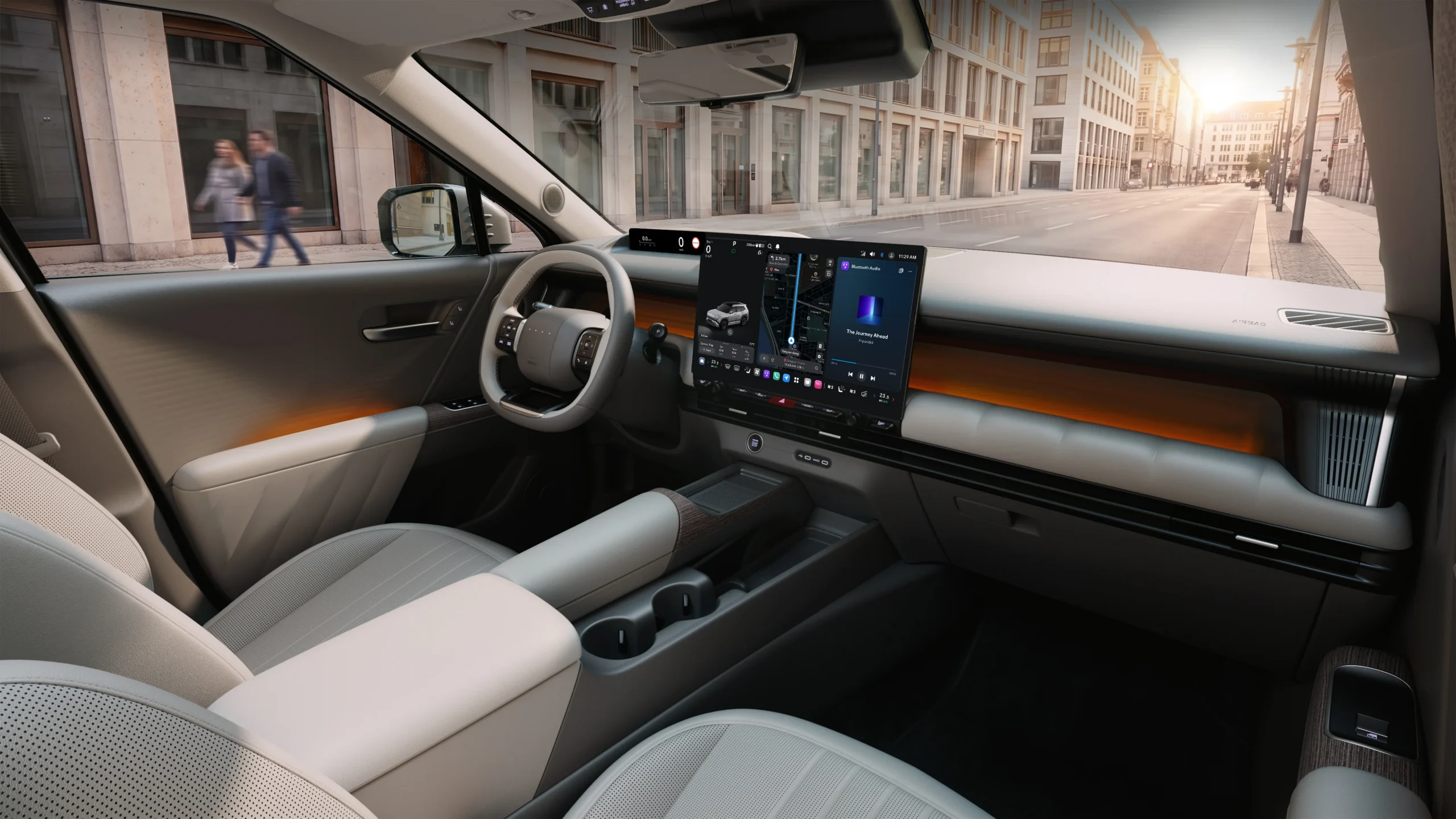 Interior del Hyundai Tucson 2027 con pantalla central y asientos.