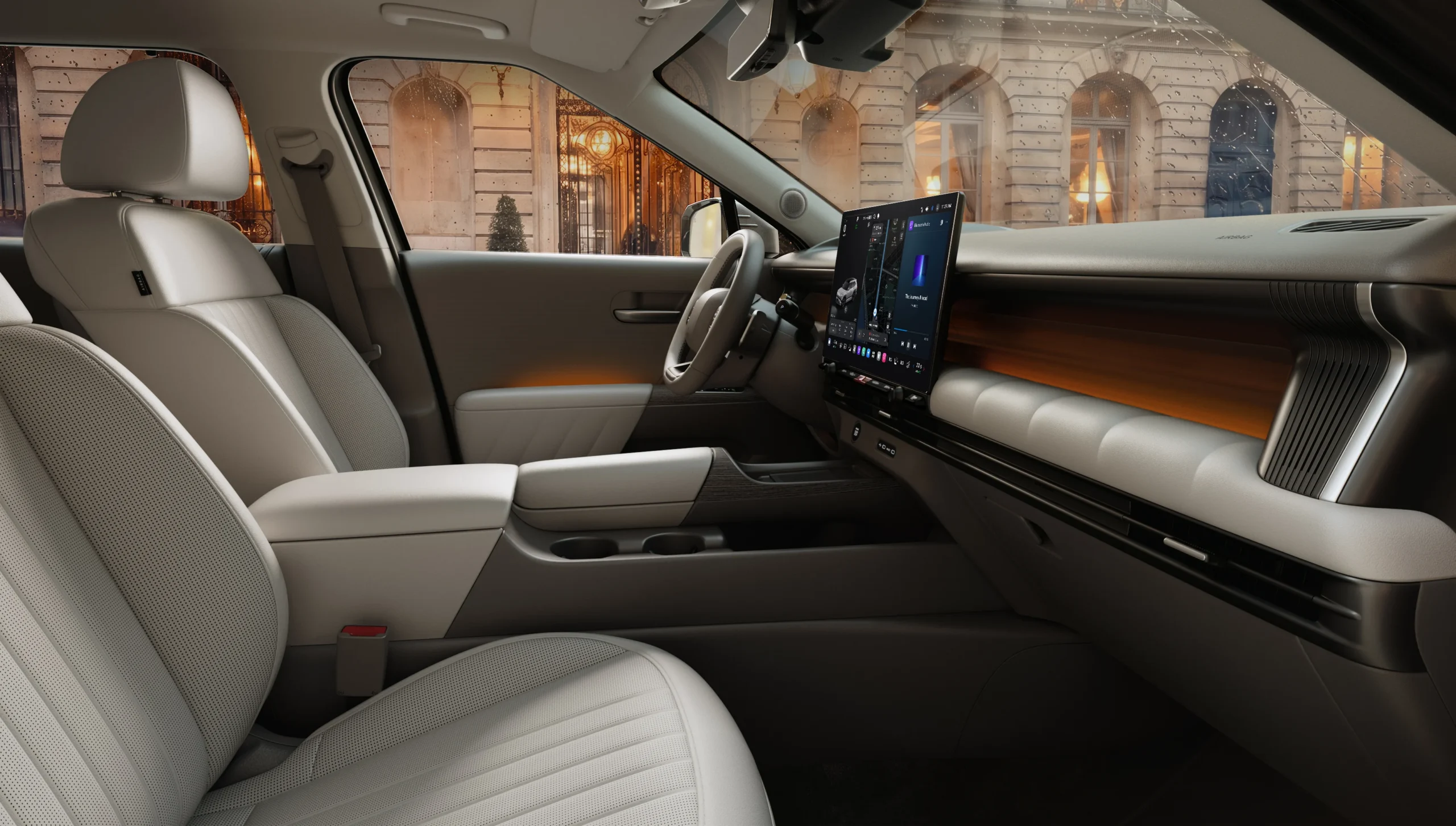 Interior del Hyundai Tucson 2027 con pantallas y asientos claros