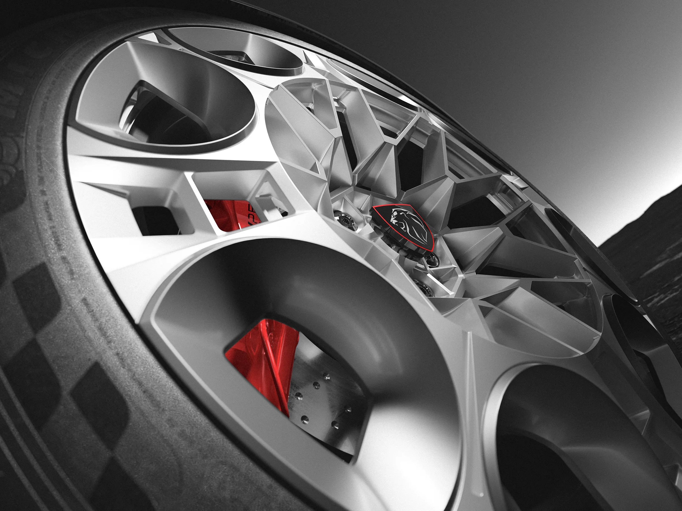 Rin del Peugeot E-T16 Concept con pinzas rojas.
