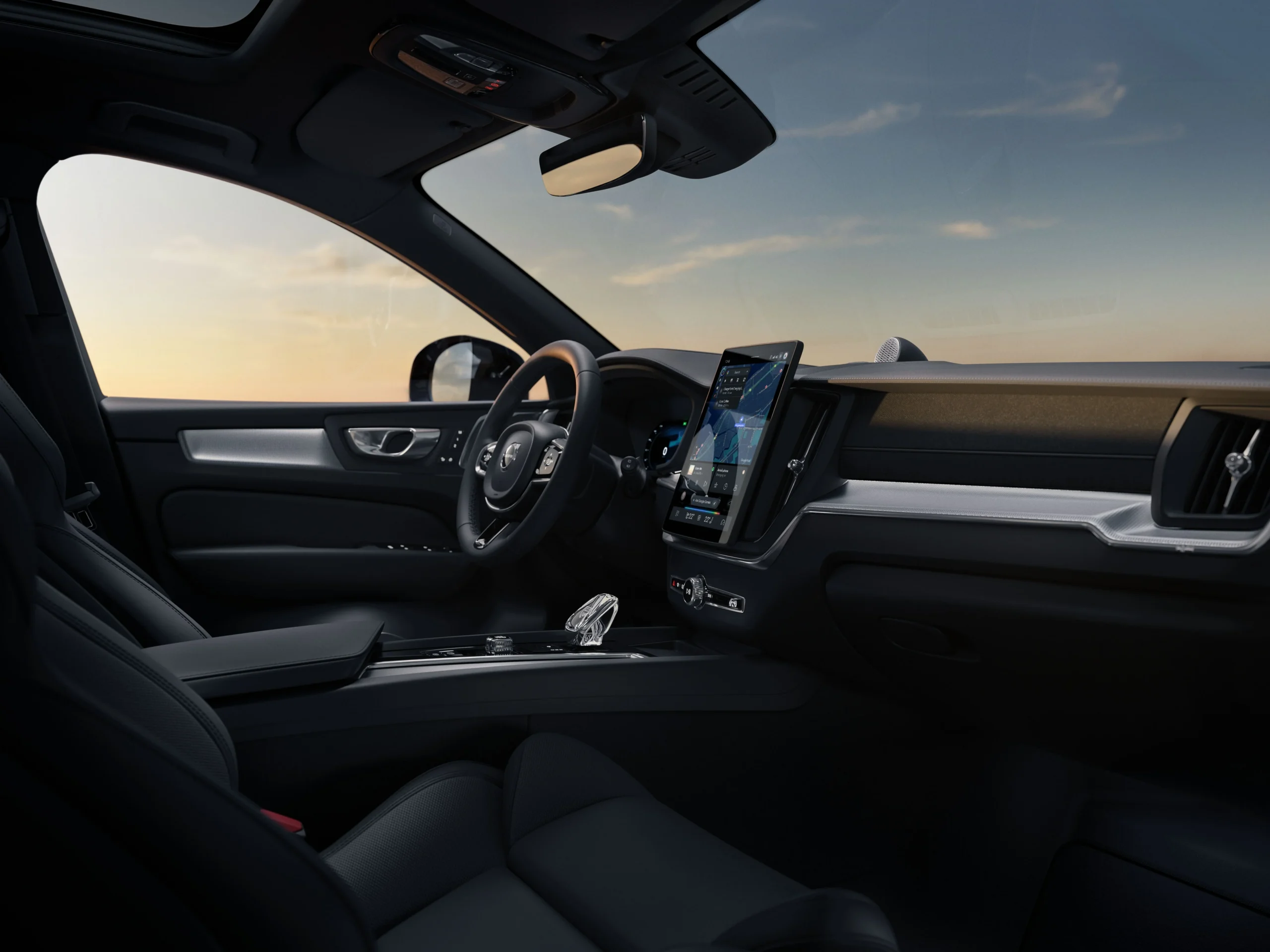 Volvo XC60 y XC90 híbridos: la autonomía extendida revoluciona la experiencia SUV 3 Volvo XC60 y XC90 híbridos: Interior del Volvo XC60 con pantalla táctil central.